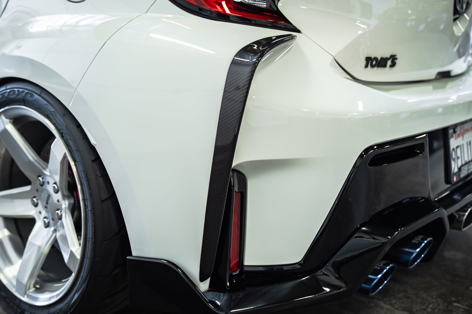 TOM'S Racing - Carbon Fiber Rear Bumper Garnish - Toyota GR Corolla [2023+]