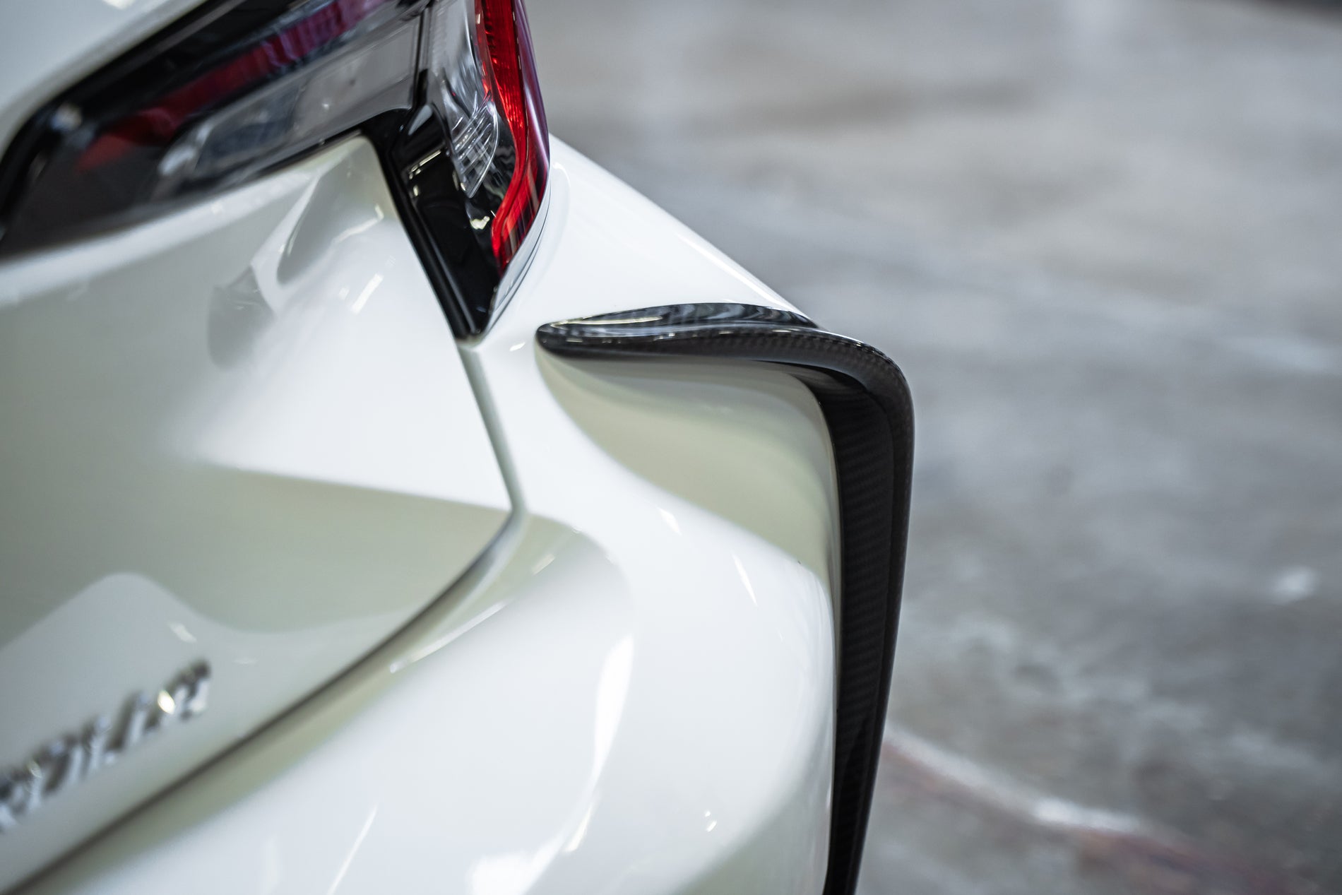 TOM'S Racing - Carbon Fiber Rear Bumper Garnish - Toyota GR Corolla [2023+]