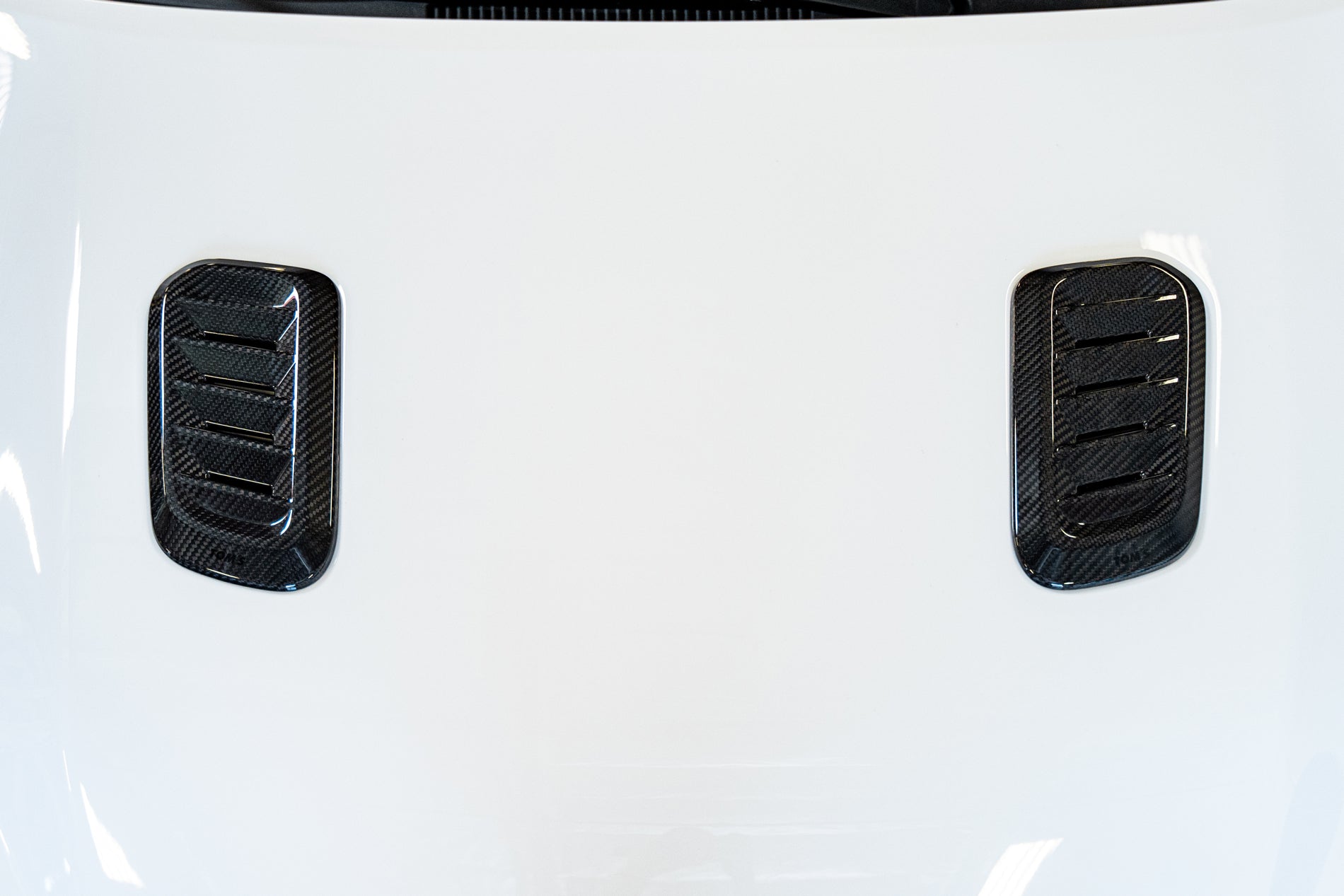 TOM'S Racing - Carbon Fiber Hood Vent Cover (Carbon) - Toyota GR Corolla [2023+]